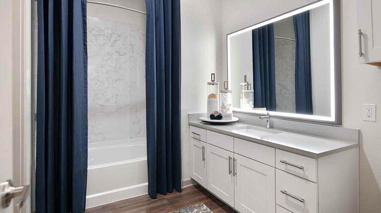 Bathroom with large vanity and soaking tub