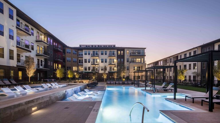 Luxurious two-tiered pool with poolside cabanas