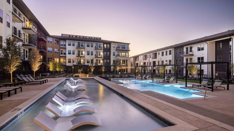 Luxurious Two-Tiered Pool with Poolside Cabanas