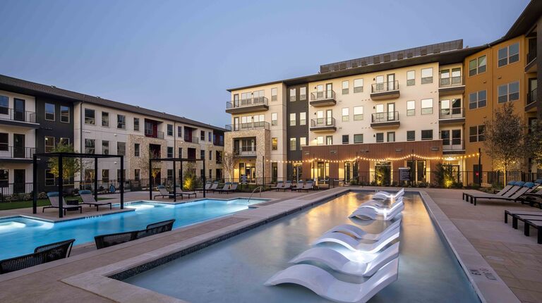 Luxurious two-tiered pool with poolside cabanas