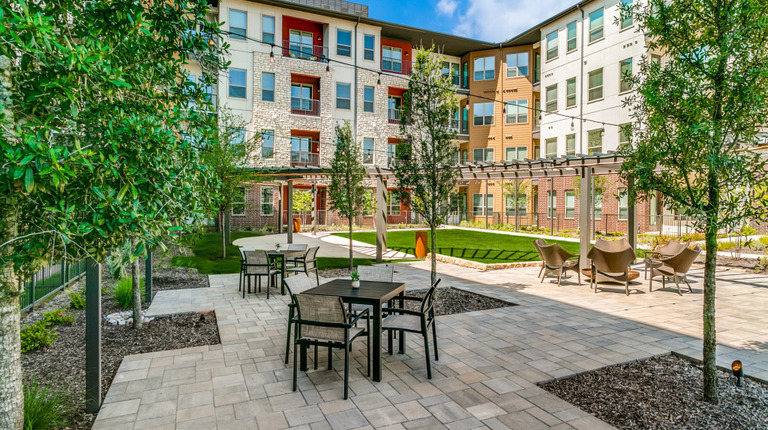 Outdoor courtyard with dining tables