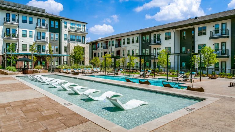 Resort-style pool with baha shelf