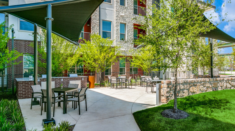 Outdoor grills and dining tables