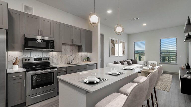 Modern kitchen with large island and barstool seating